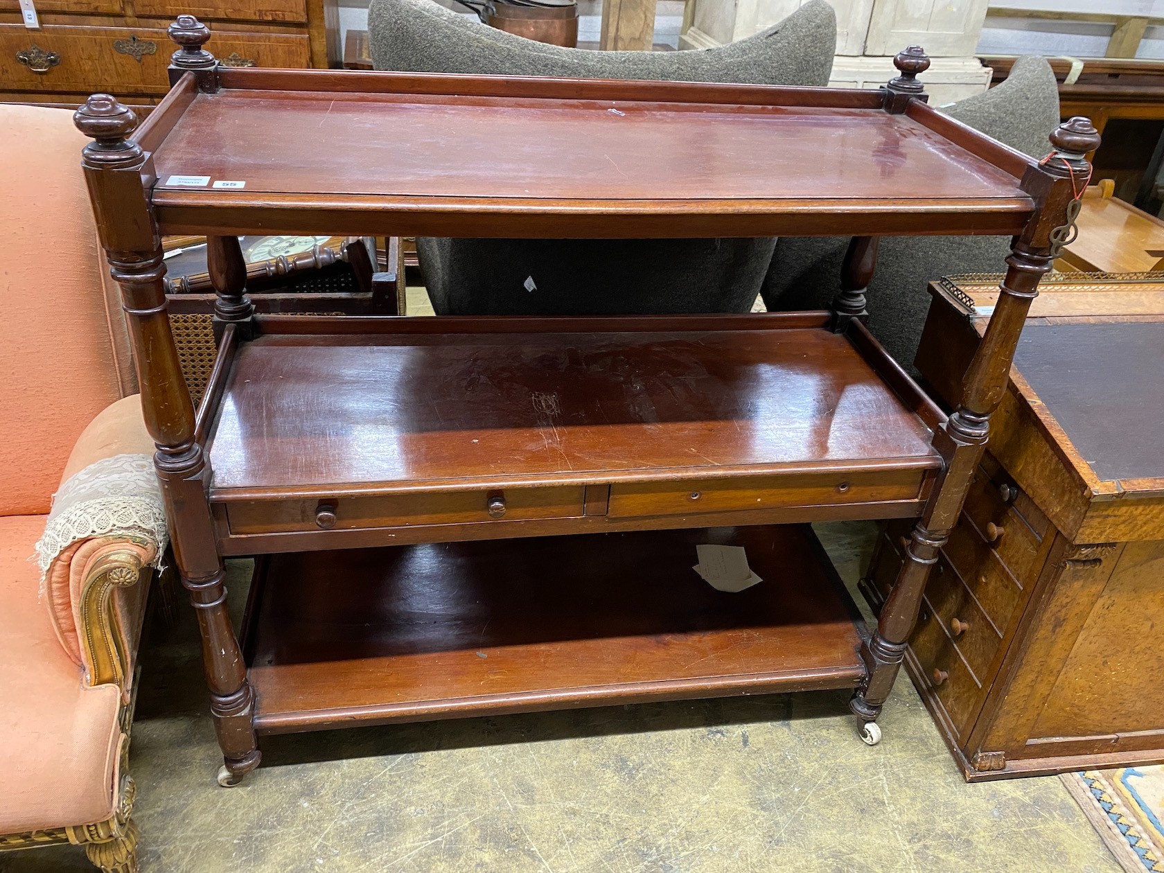 A Victorian mahogany three tier buffet, length 115cm, depth 49cm, height 112cm